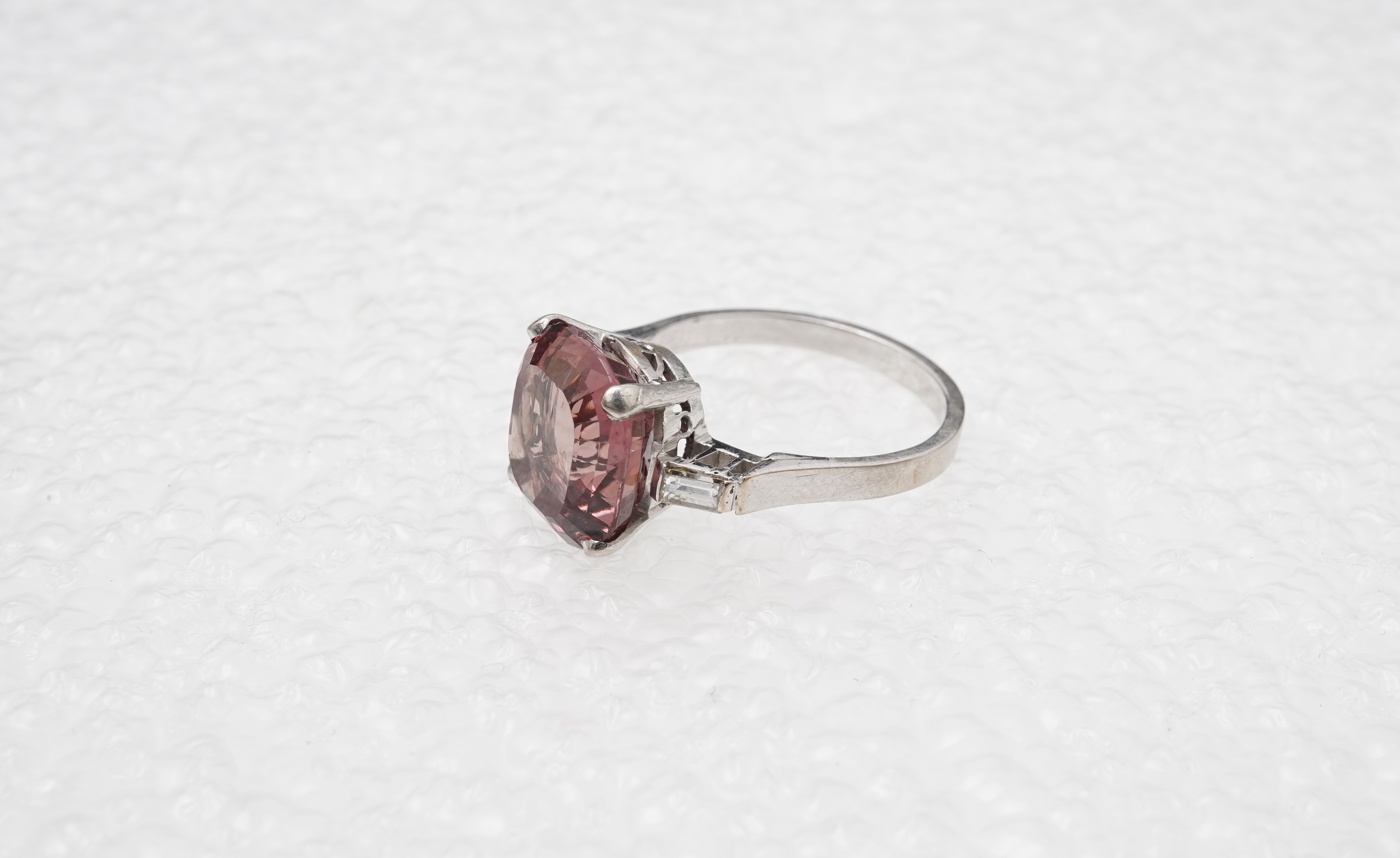 A garnet and diamond ring